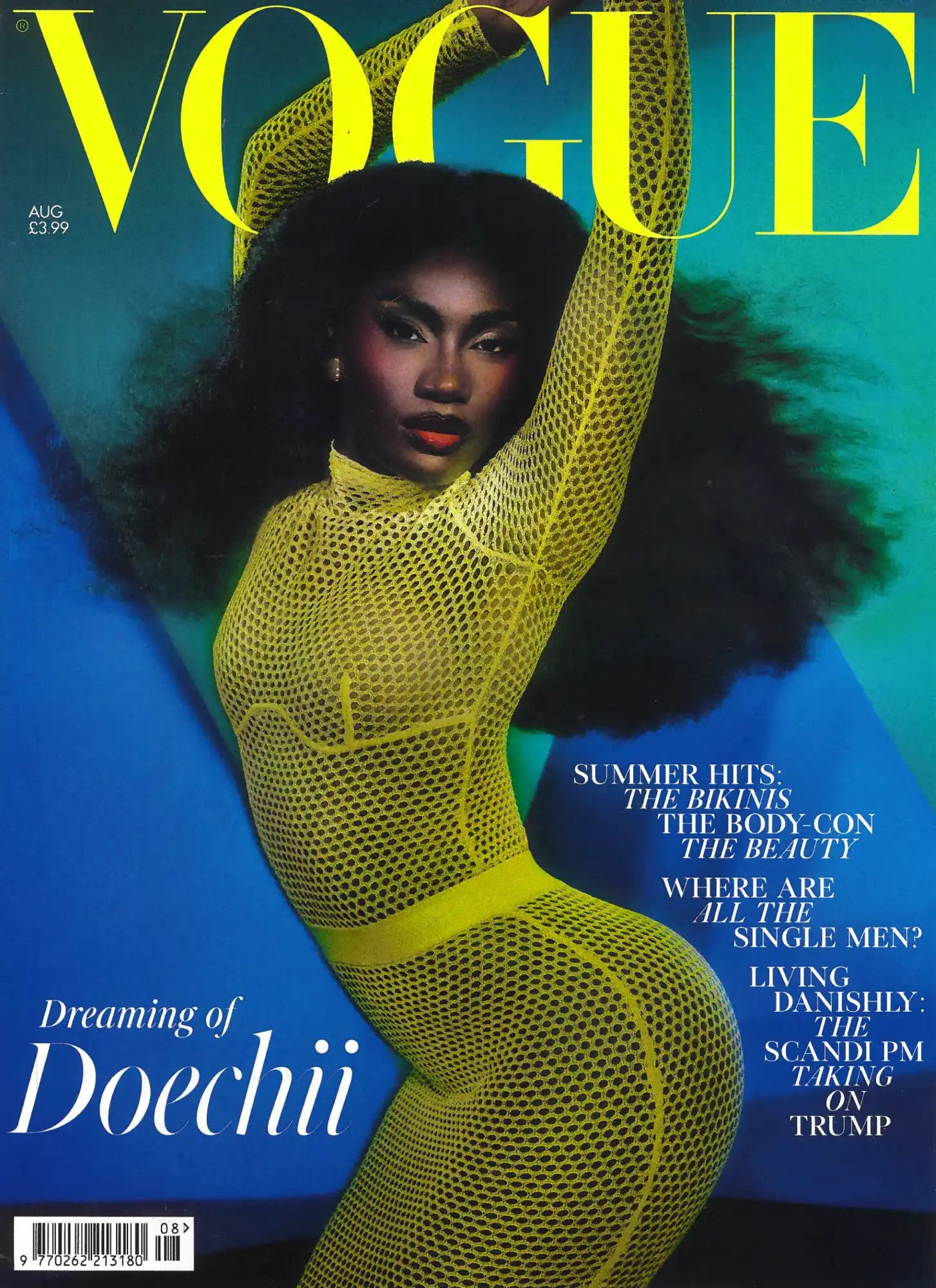 A magazine cover featuring a person in a yellow mesh outfit.