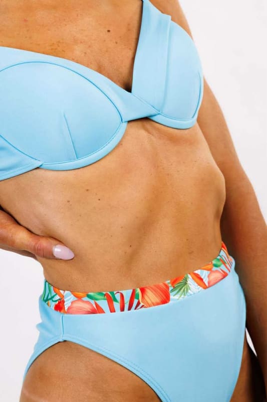 Model wearing the Allegra Underwire Bikini Top by Zinzina Swimwear, styled for luxury coastal escapes