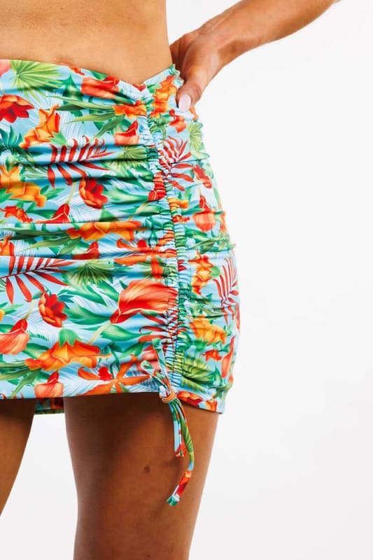 Model wearing the Gisela Mini Skirt by Zinzina Swimwear, styled for luxury coastal escapes