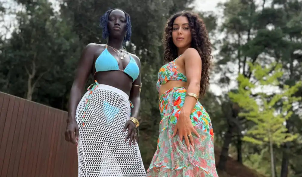 Two women posing in swimwear.