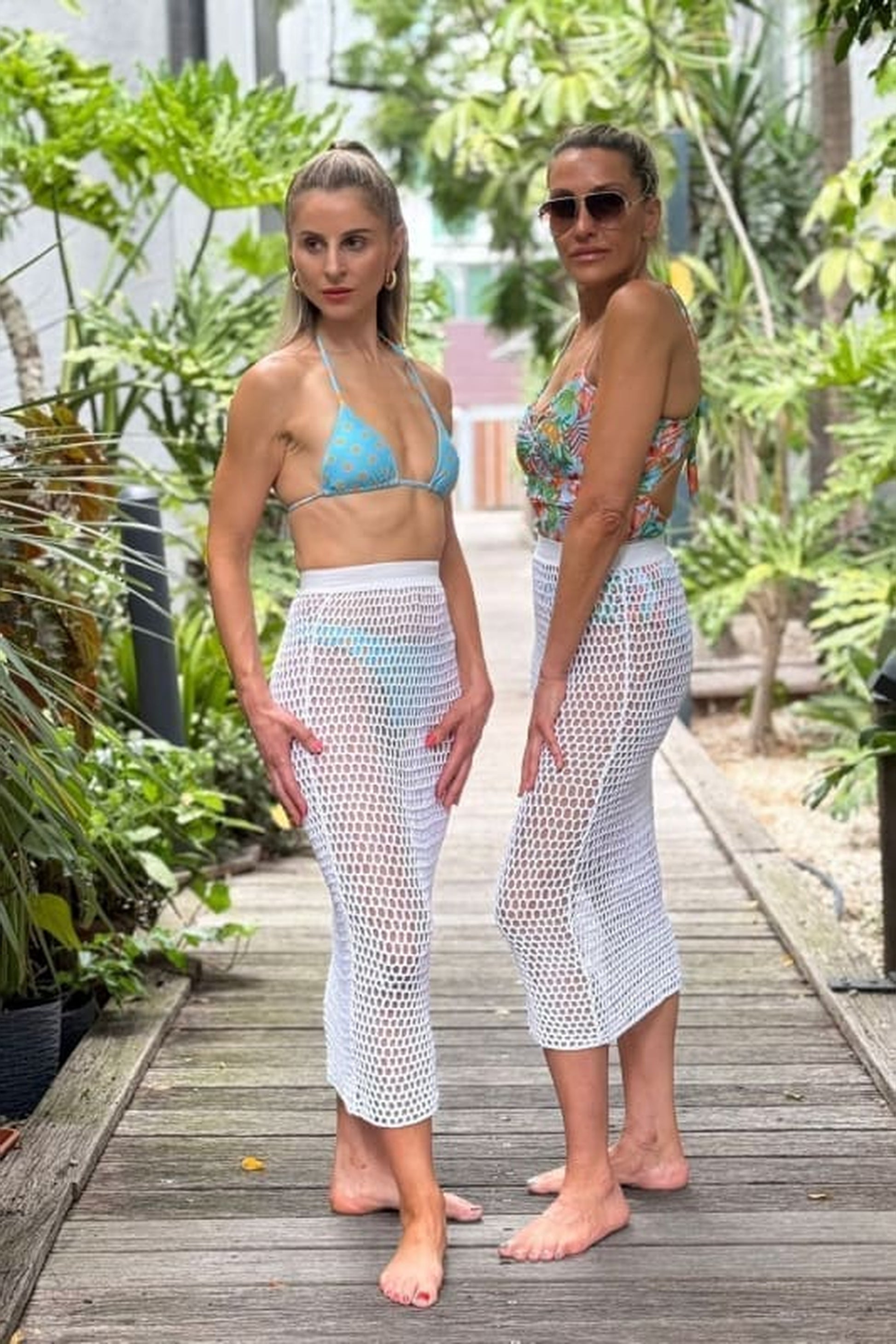 Luna Crochet Skirt by Zinzina Swimwear, styled for a resort evening beside the coast.