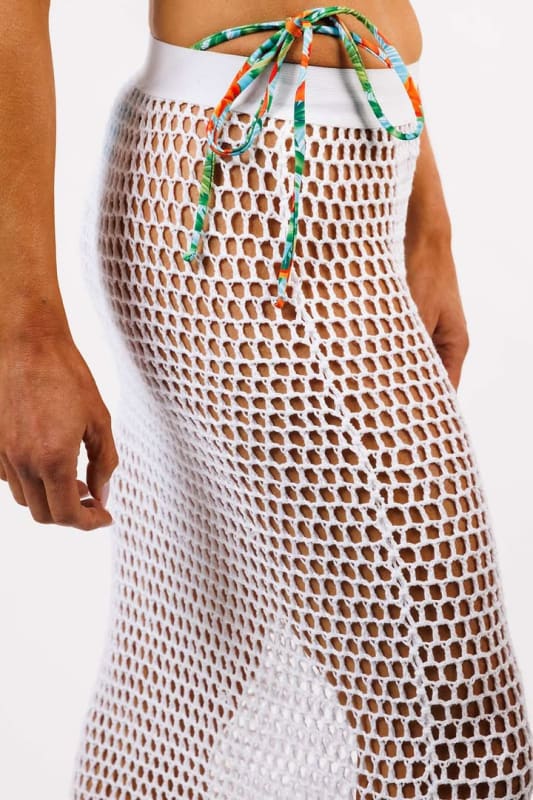 Side profile of the Luna Crochet Skirt by Zinzina, showing the flow and drape of the fabric.