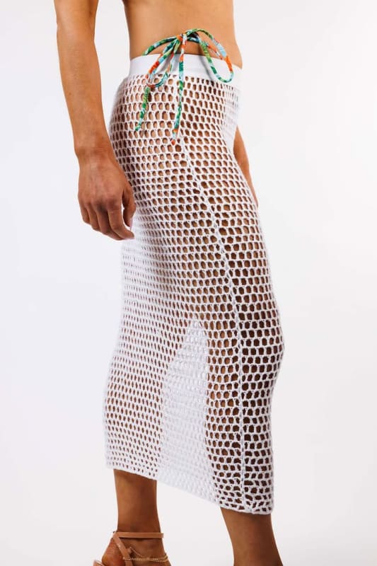 Side profile of the Luna Crochet Skirt by Zinzina, showing the flow and drape of the fabric.