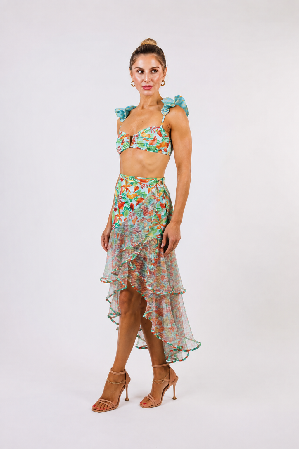 Model walking in the Sofia Wrap Skirt by Zinzina, showing how the piece moves.